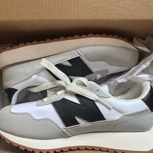 New Balance White and Black Sneakers Classic Design